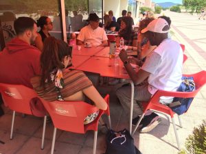 Group discussion but outdoors with faculty mentors